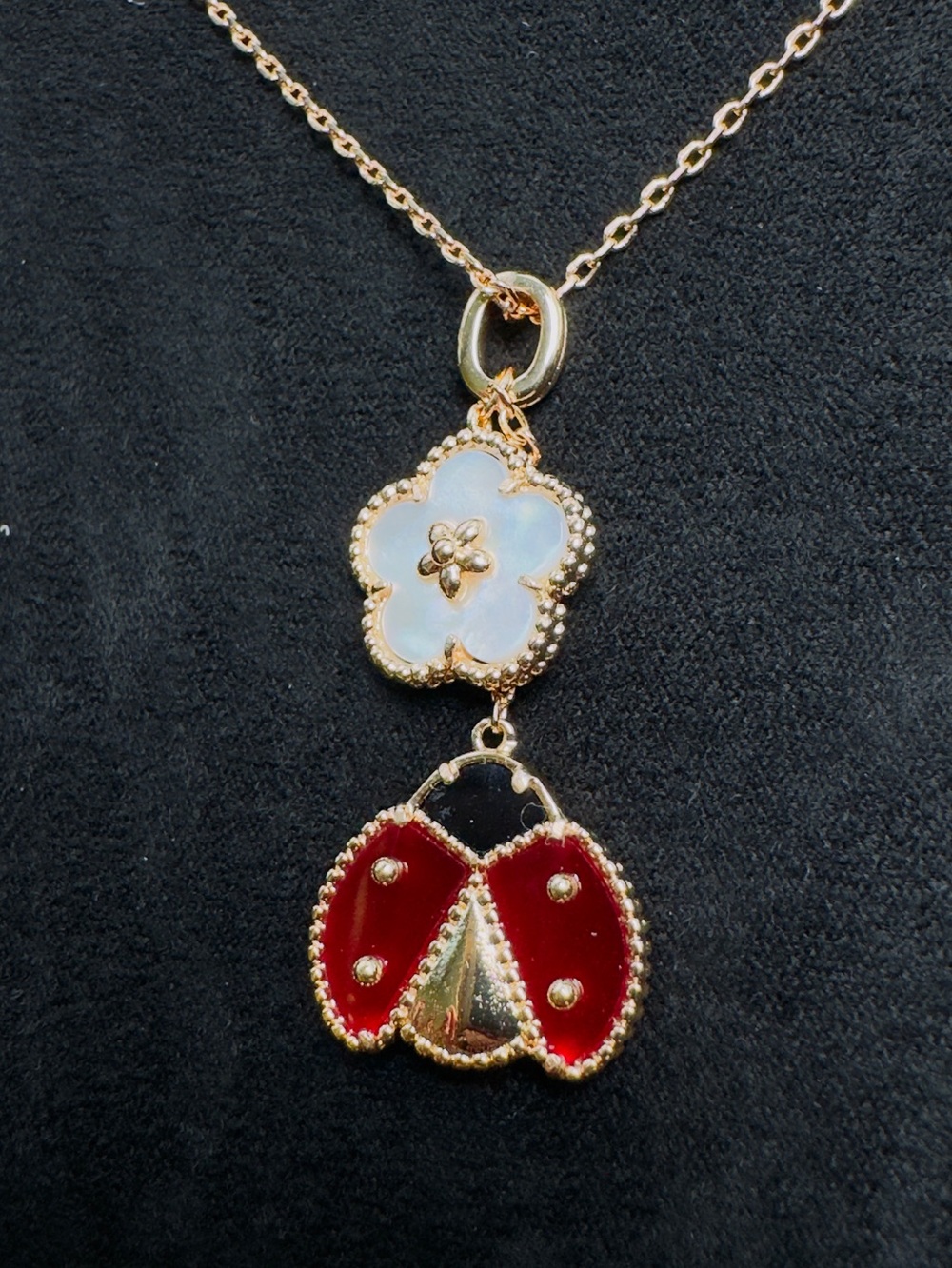 Gold-Tone Red Enamel Ladybug Pendant Necklace with Mother-of-Pearl Flower